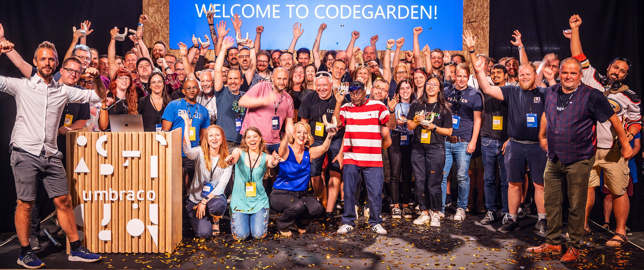 A photo by Umbraco HQ on Flickr of MVPs and a couple of HQers on stage at Codegarden 2023, celebrating the announcements of the new MVPs