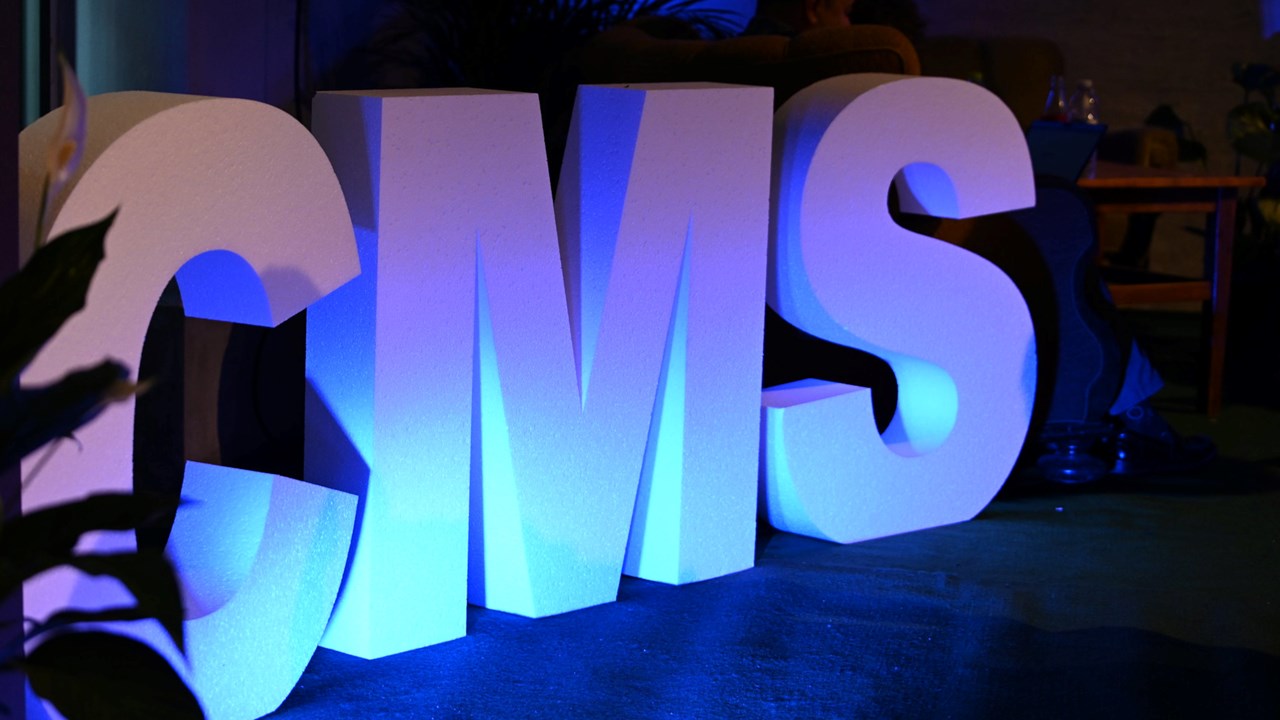 A photo by Umbraco HQ on Flickr of large 3D letters "CMS" at Codegarden.